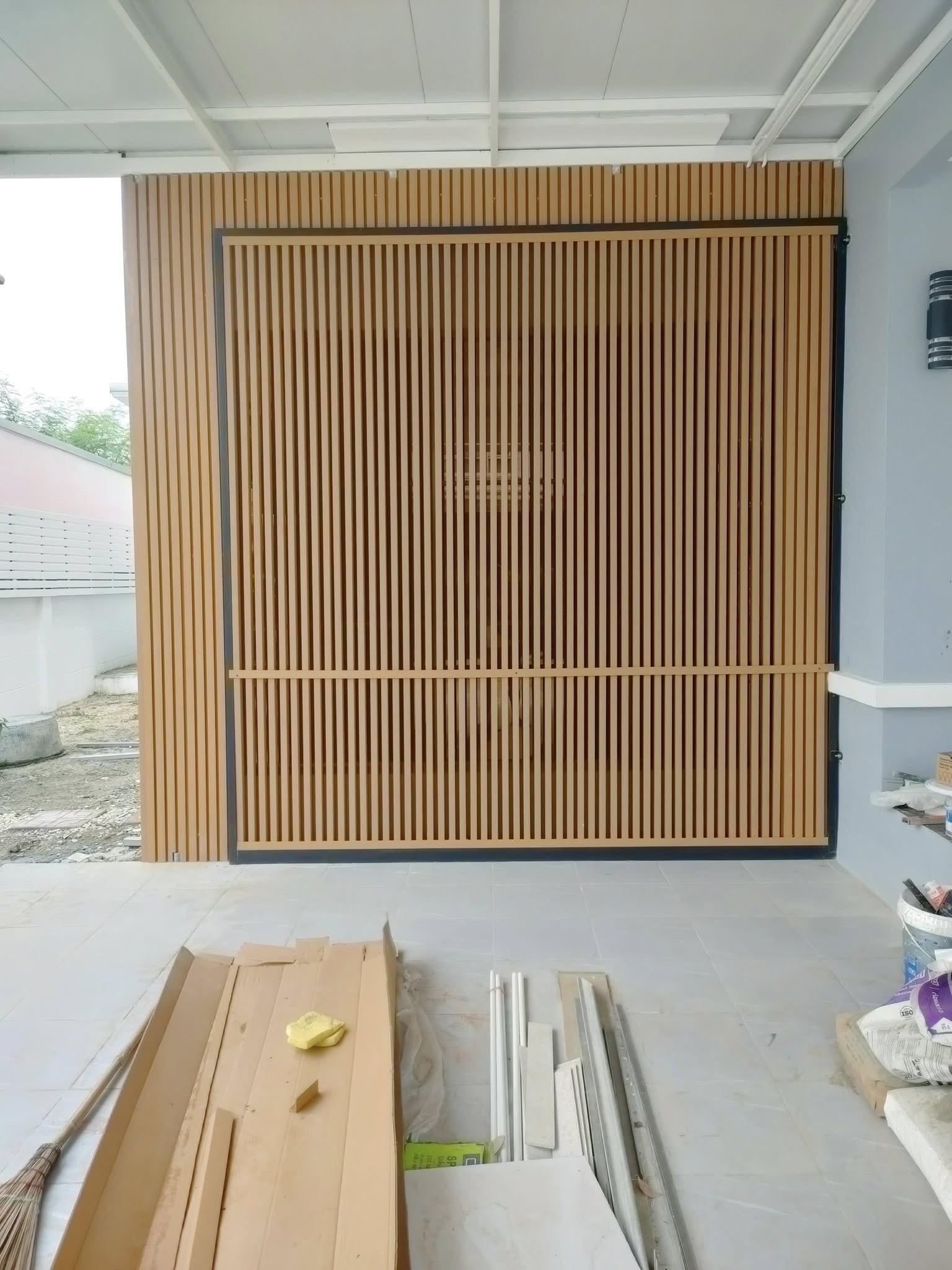 Weather-resistant WPC composite panels installed on beachfront property exterior walls