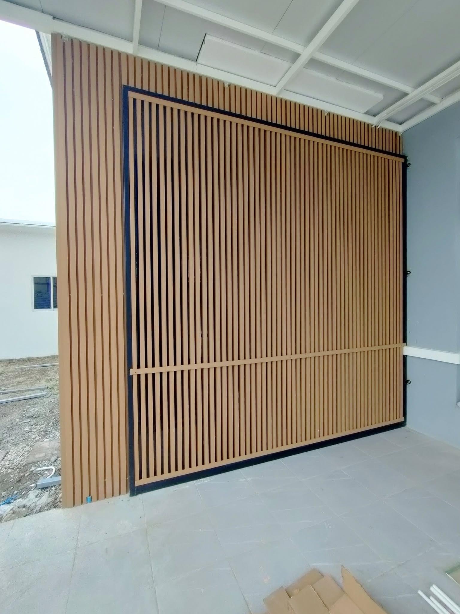 Weather-resistant WPC composite panels installed on beachfront property exterior walls