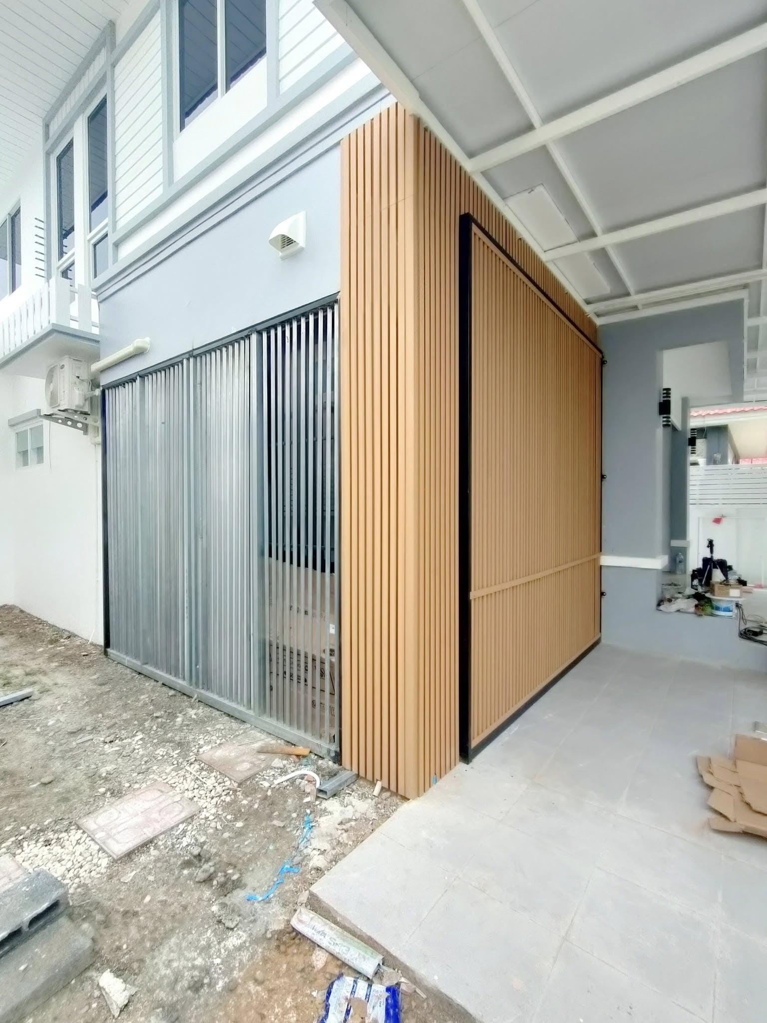 Before and after transformation showing WPC cladding upgrade on Koh Samui home