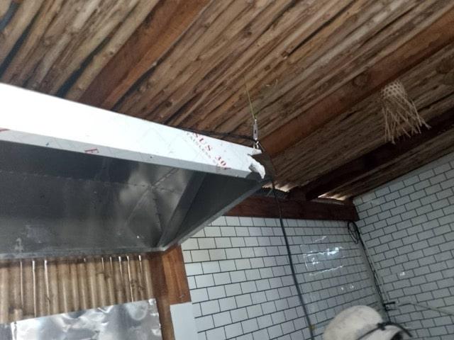 Commercial range hood installation in Samui restaurant kitchen