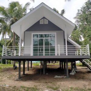 rofessional knockdown house construction service in Koh Samui showing modern prefab home with tropical landscape